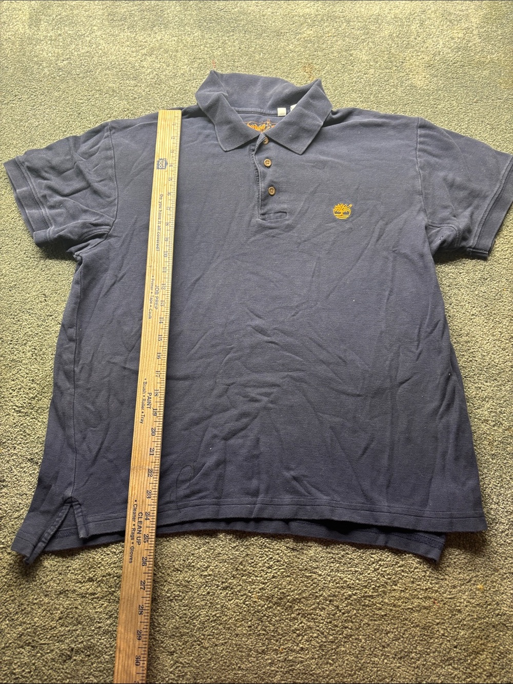 Timberland Men's L Navy Polo with Gold Logo faded